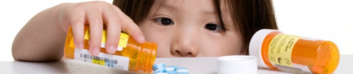 a child holding a bottle